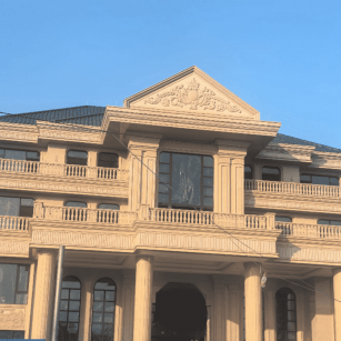 沧州黄金麻别墅外墙干挂石材效果示例