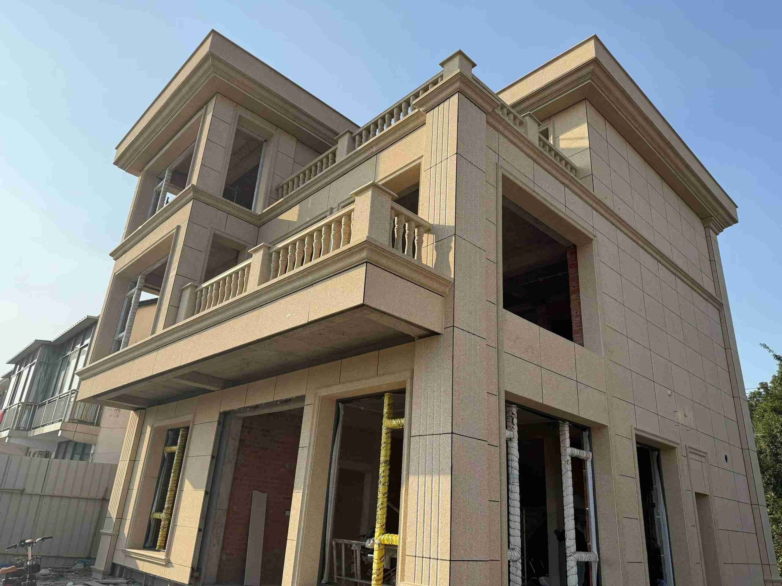 沧州 黄金麻花岗岩石材荔枝面外墙干挂效果展示